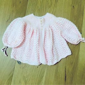 Hand knit cardigan for baby
